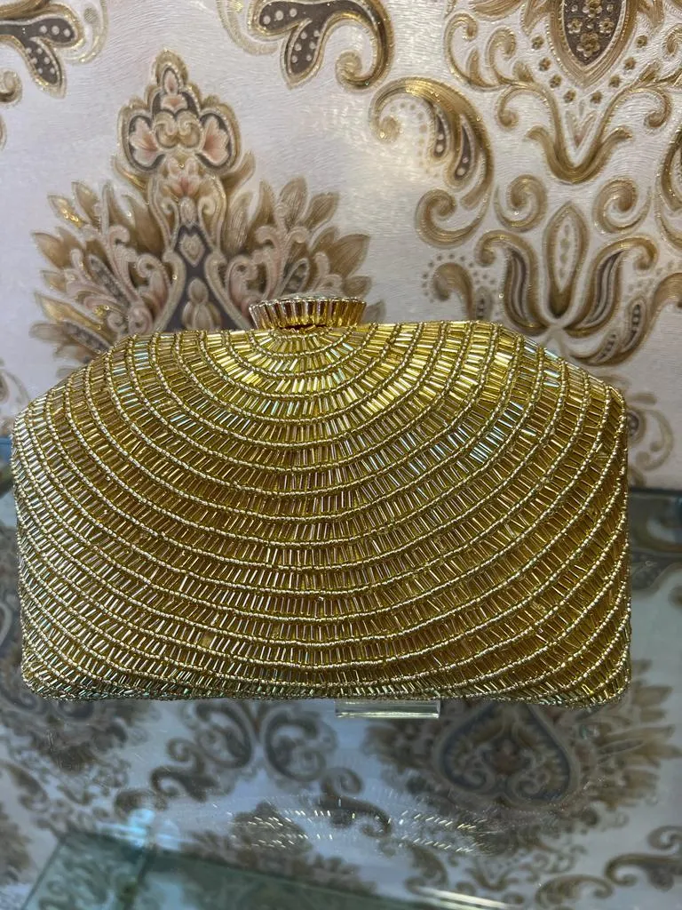 Golden inspired clutch bag