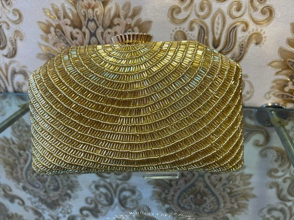 Golden inspired clutch bag