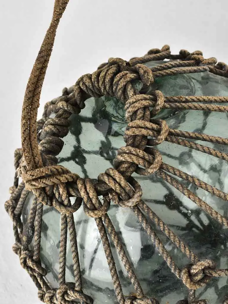 Netted glass fishing float 1930s,  12½"