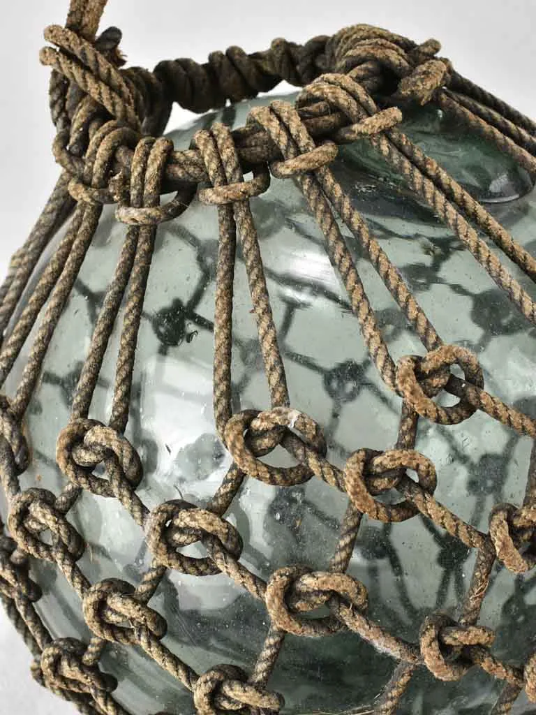 Netted glass fishing float 1930s,  12½"