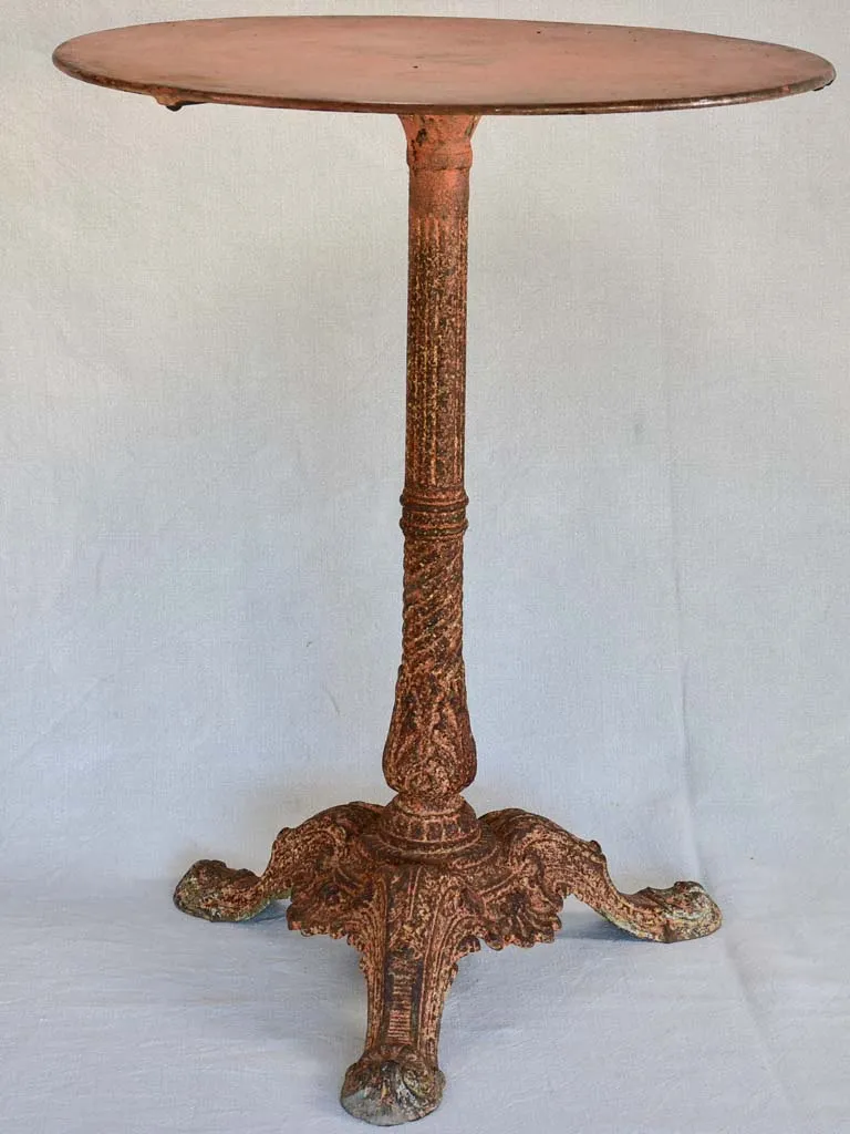 Nineteenth-century French garden table with salmon red patina