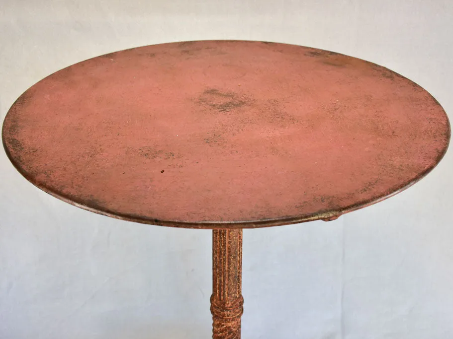Nineteenth-century French garden table with salmon red patina