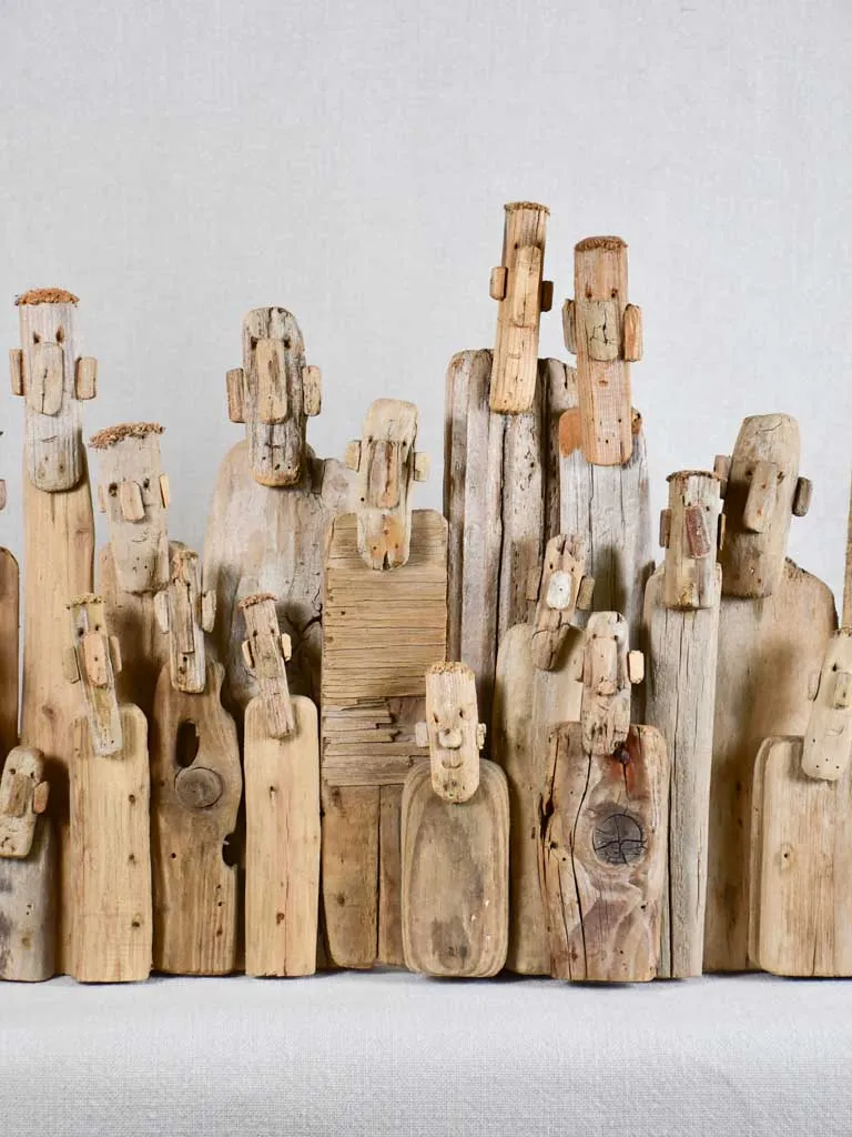 Panoramic driftwood sculpture by JP Dreano - 31 characters 28¾"