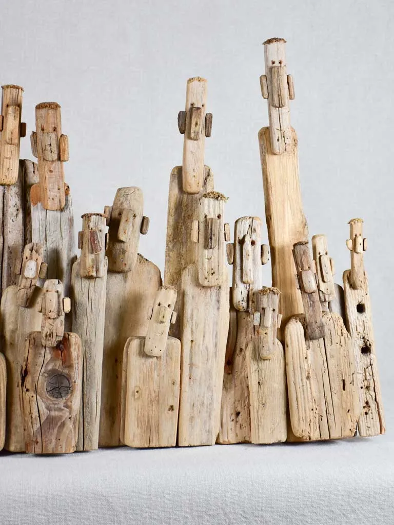 Panoramic driftwood sculpture by JP Dreano - 31 characters 28¾"