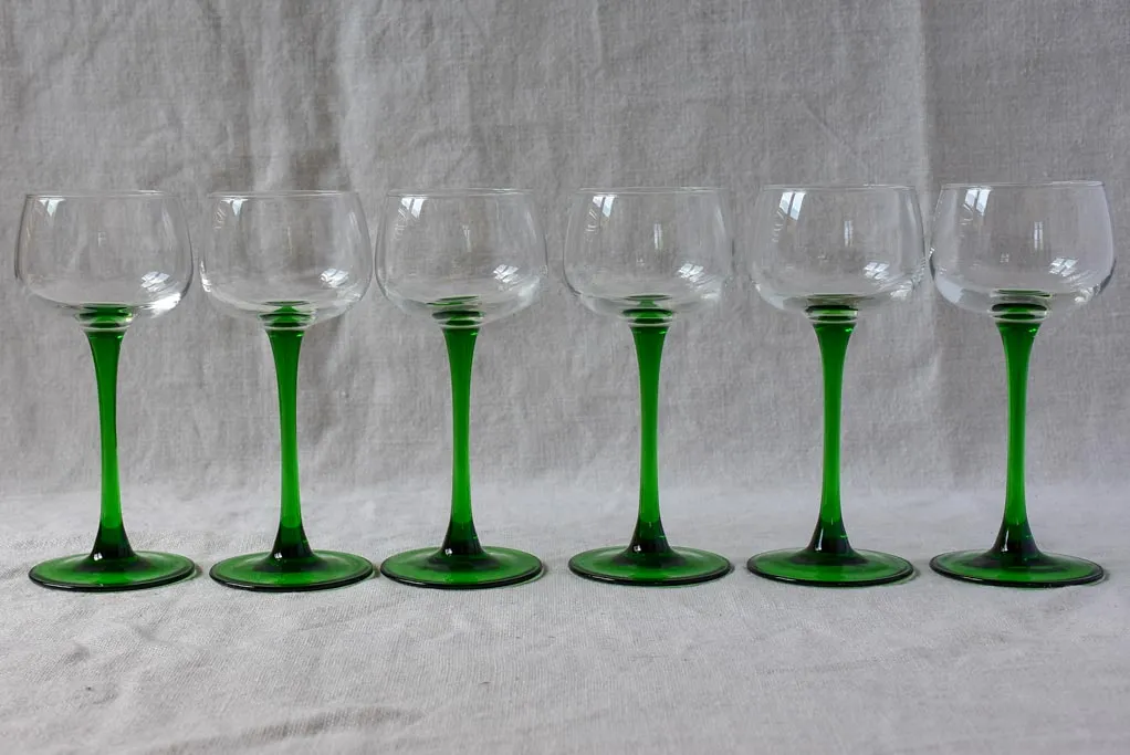Six vintage Alsatian wine glasses with green stems