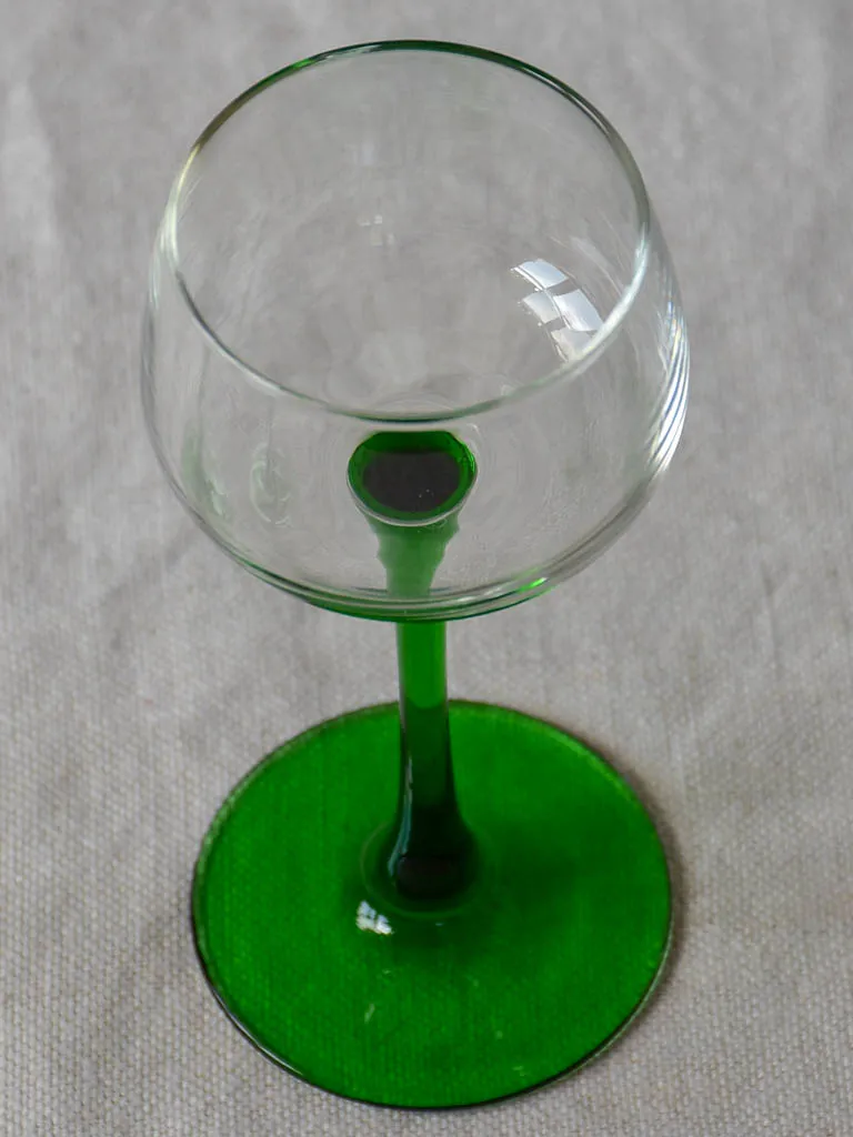 Six vintage Alsatian wine glasses with green stems